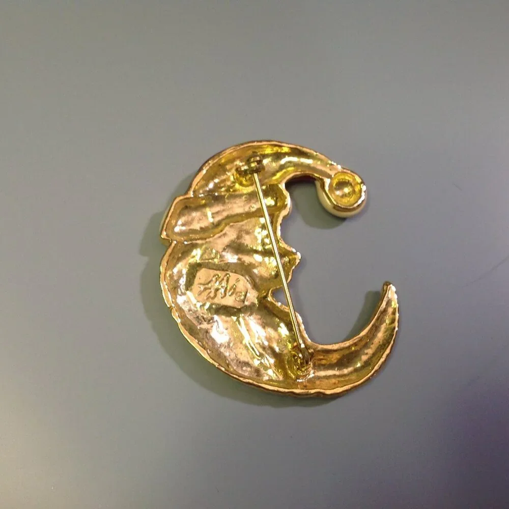 Christmas Brooch Santa Claus in the Crescent Moon Accessories Associates, Inc.